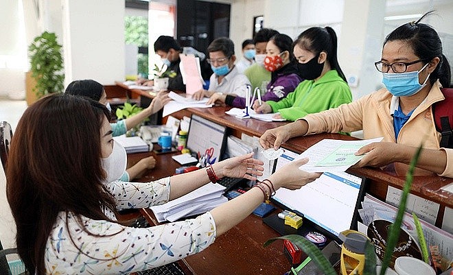 Tết Nguyên đán: Thanh toán đầy đủ, kịp thời chế độ cho người tham gia bảo hiểm xã hội