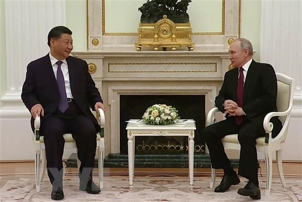 Chu tich Tap Can Binh moi Tong thong Putin tham Trung Quoc hinh anh 1