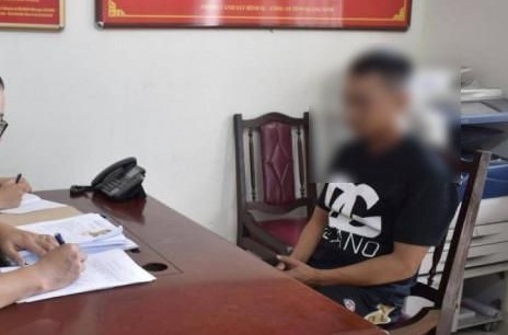 Đối tượng Nguyễn Quang Kiên tại cơ quan công an.