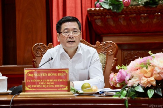 chum anh doan cong tac cua bo cong thuong lam viec voi tinh tien giang