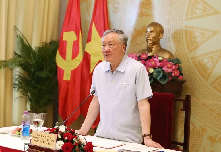 Phó Thủ tướng Thường trực Chính phủ Nguyễn Hòa Bình làm việc với lãnh đạo TPHCM về công tác triển khai xây dựng TTTC quốc tế tại Việt Nam - Ảnh: VGP/Nguyễn Hoàng