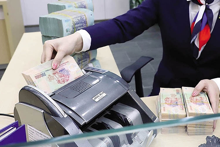 Nâng tỷ lệ bao phủ cao kỷ lục, ngân hàng giảm nỗi lo ẩn số nợ xấu