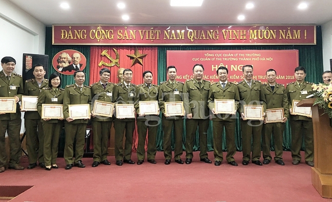 quan ly thi truong ha noi tien phong trong cong tac chong buon lau hang gia hang nhai