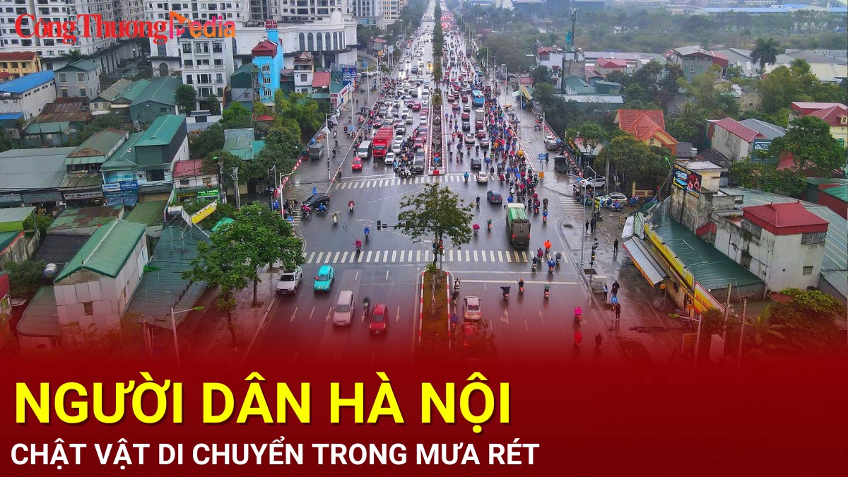 Người dân Hà Nội chật vật di chuyển trong mưa rét